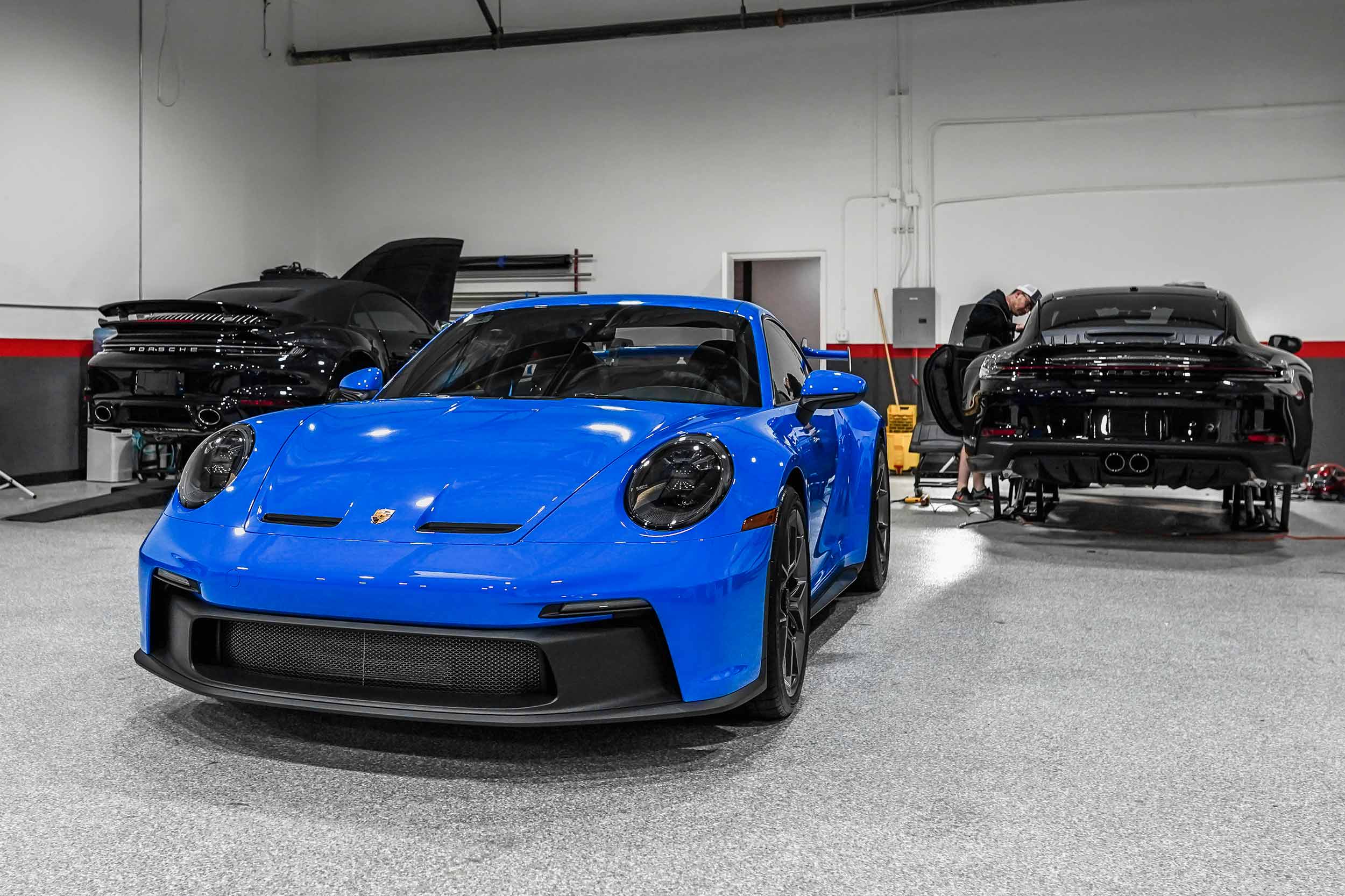 3 porsches ready for paint protection film in Orange County Shop