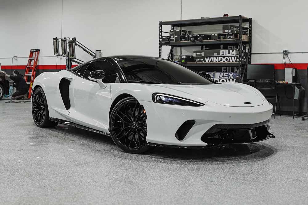 2022 white Mclaren GT after Paint Correction, paint protection film [clear bra], Ceramic Coating and window tint install in Orange, CA