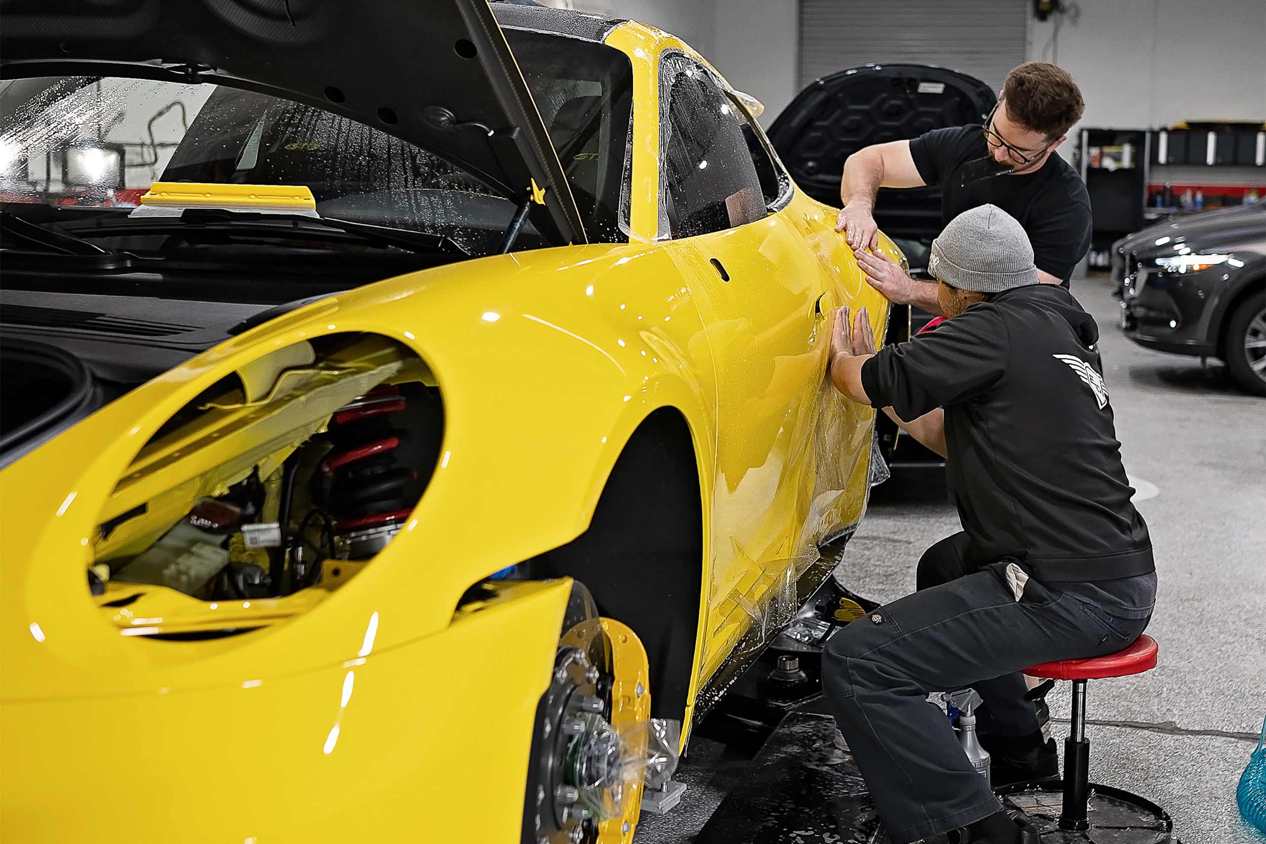 yellow-porsche-gt4-clear-bra-install-orange-ca