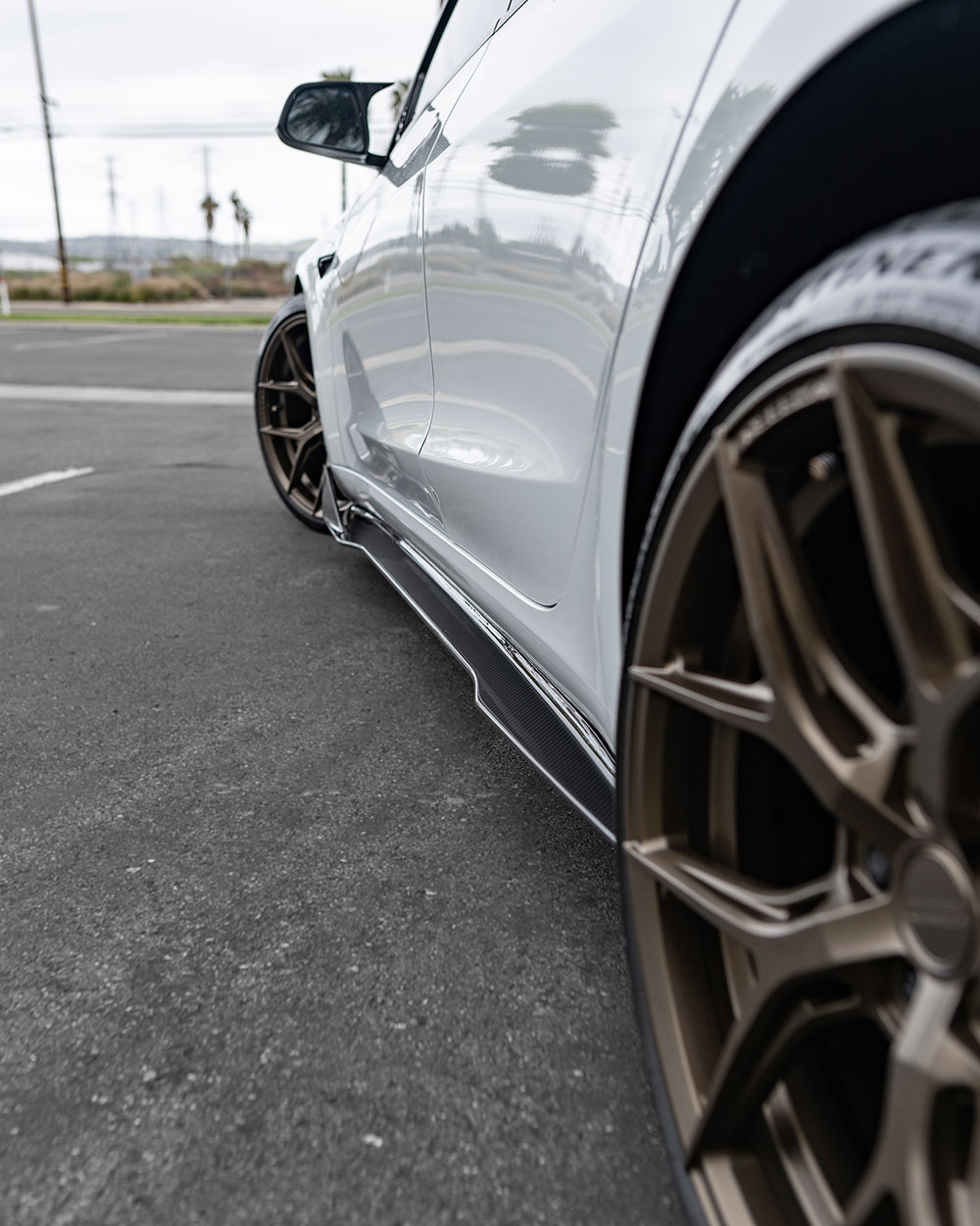 Custom White Tesla Model 3 on airbags with ADRO Carbon Fiber Kit-SFW-3