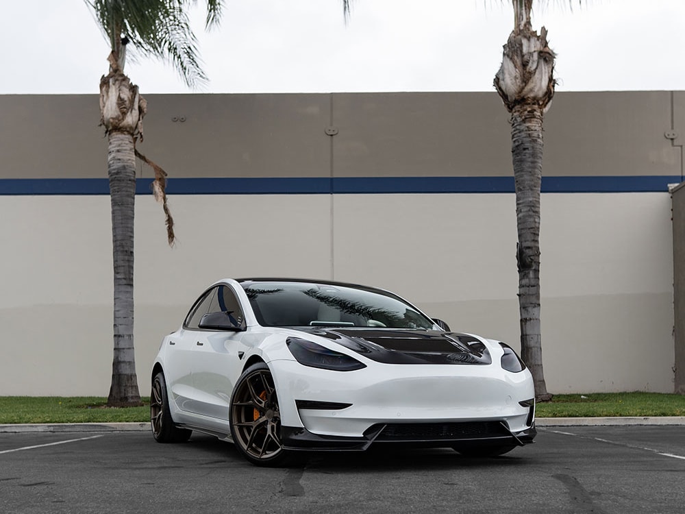 Custom White Tesla Model 3 on airbags with ADRO Carbon Fiber Kit-SFW-1