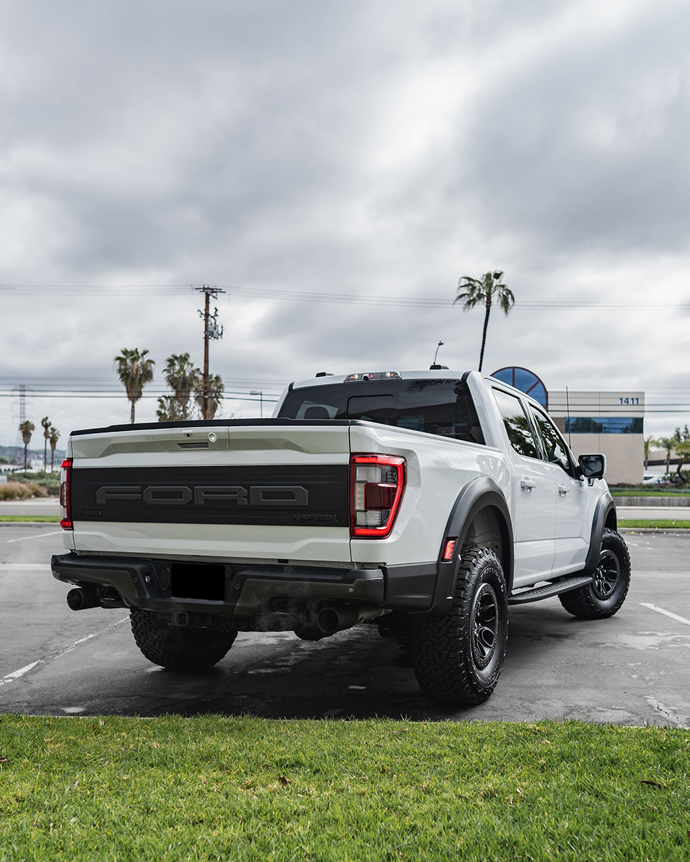 White Ford F150 Raptor paint correction and ceramic coating socal sfw7