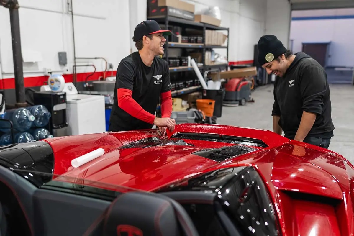 Envious Detailing installing full body paint protection film on red 2021 lamborghini huracan evo